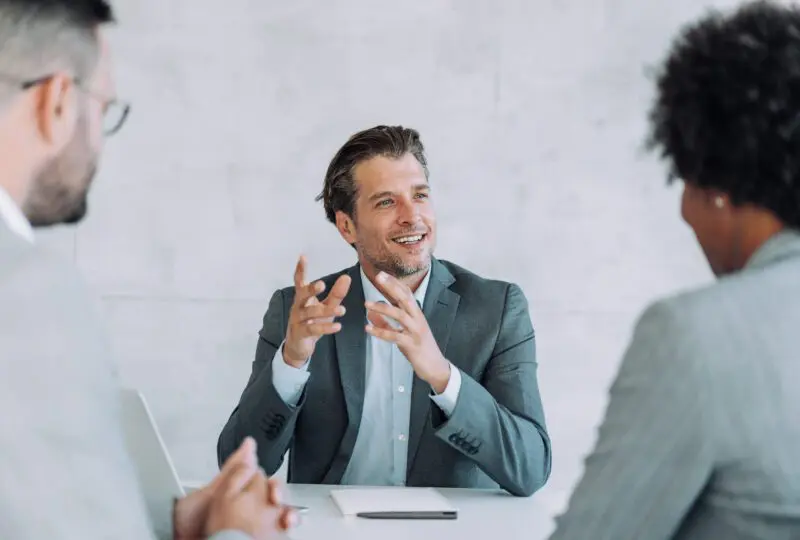 Family law attorney in meeting with clients