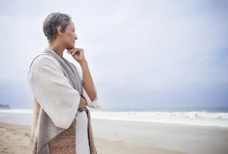 woman looking out to sea
