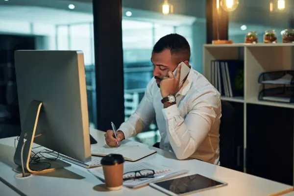 business man in office talking on phone