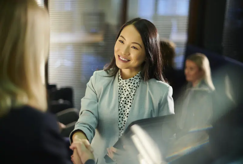 Paralegal meeting her client at the office