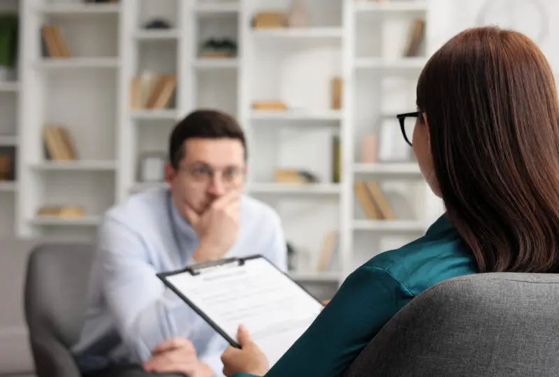 man seeing a mental health professional
