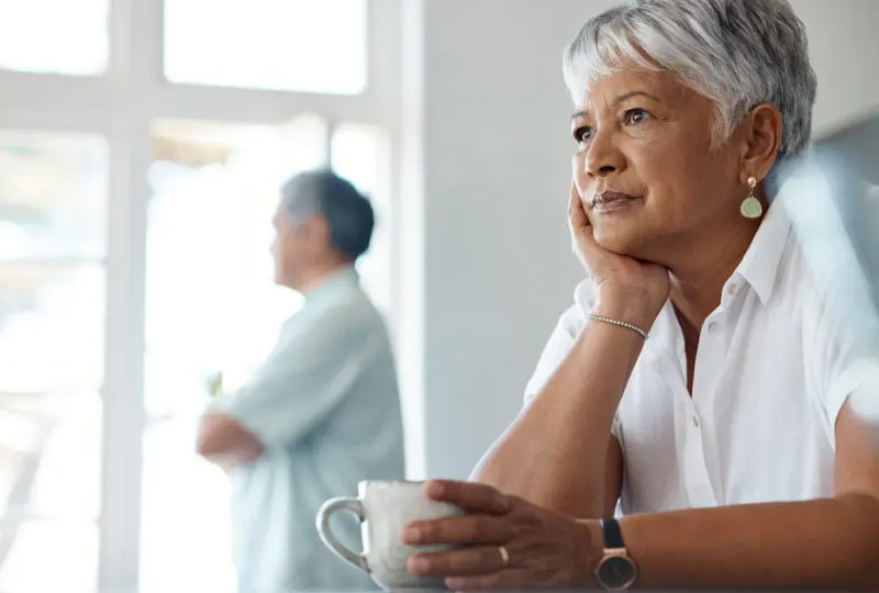 husband and wife looking away from eachother