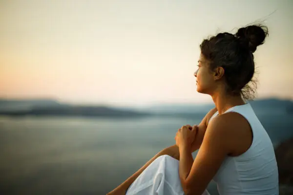 woman looking out into the horizon
