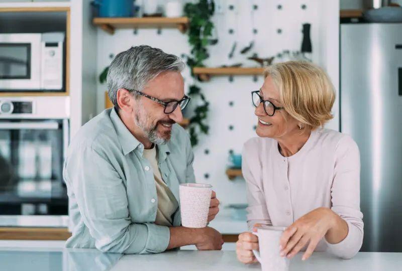 couple having coffee together in their kitchen