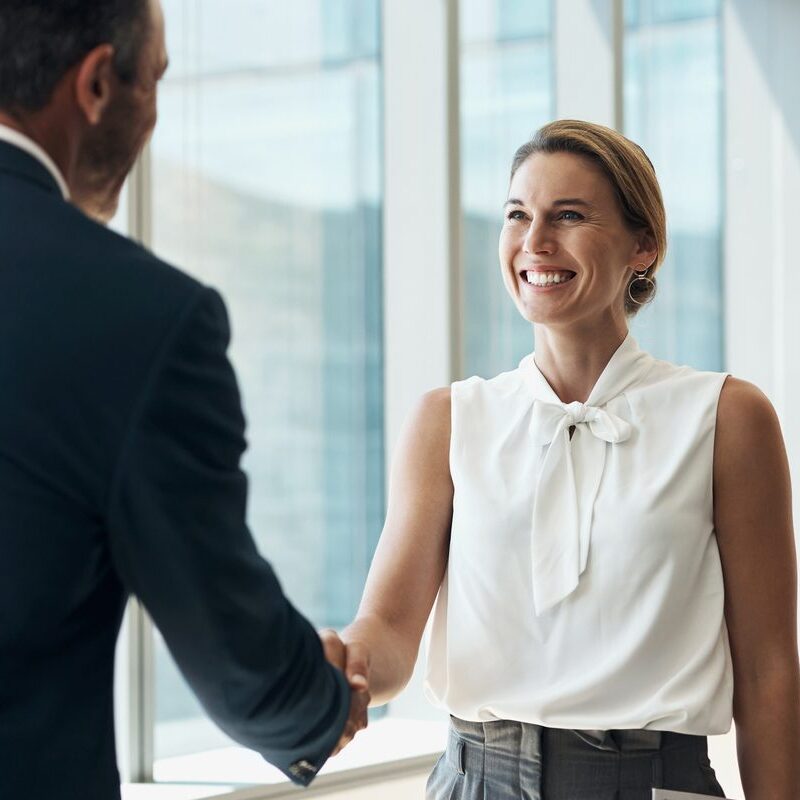 client and attorney shaking hands