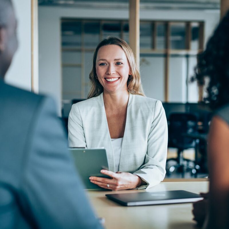 mediator and clients sitting around table