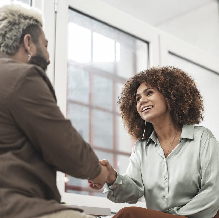 attorney shaking hands with a client