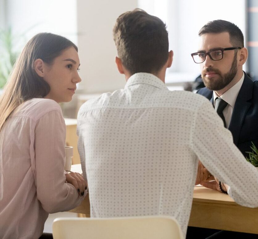 couple meeting with divorce lawyer