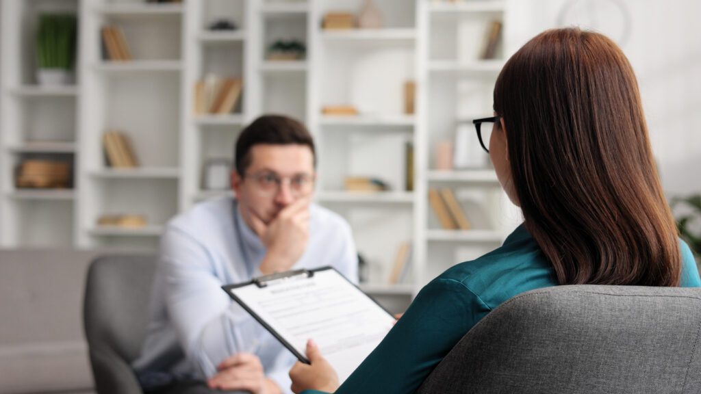 man seeing a mental health professional