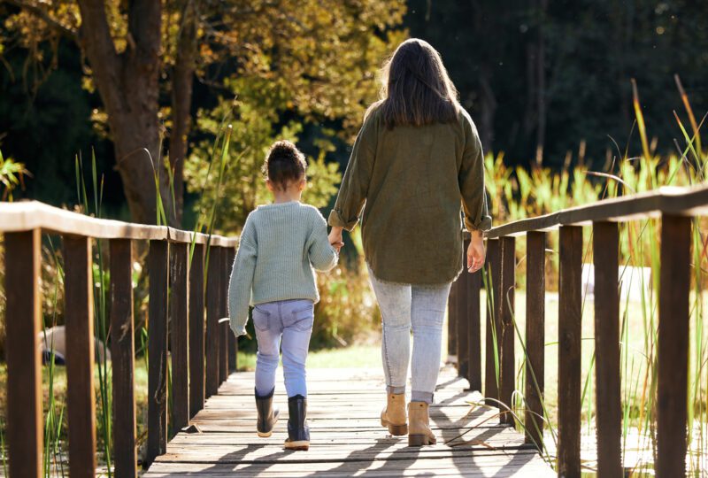 mother and daughter taking a walk