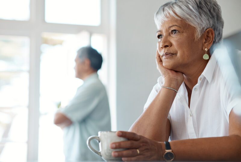 husband and wife looking away from eachother
