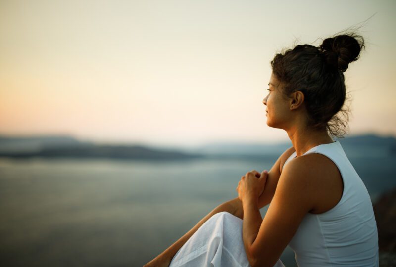 woman looking out into the horizon