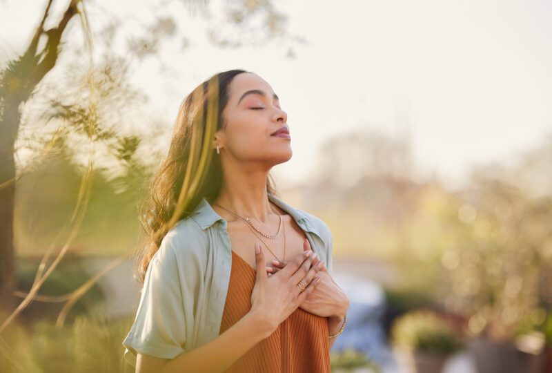 Woman meditating in nature