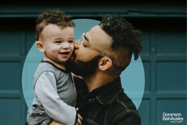 Father holding his child