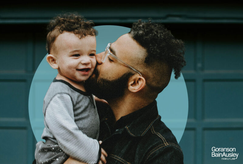 Father holding his child